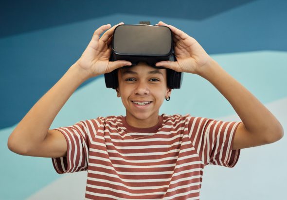 Boy wearing VR headset